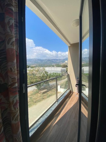 Уютная квартира планировки 1+1 в элитном районе Каргыджак - Ракурс 4