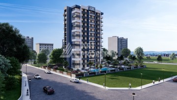 Проект с квартирами 1+1 с отличной локацией в районе Енишехир, 62 кв.м. - Ракурс 4