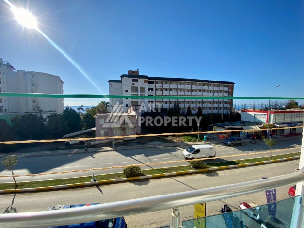 Квартира 1+1 с видом на море  всего в 100 метрах от моря в районе Каргыджак - Ракурс 2