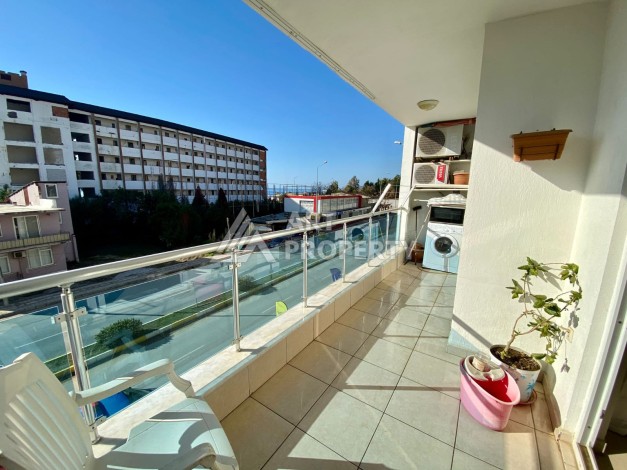 Квартира 1+1 с видом на море  всего в 100 метрах от моря в районе Каргыджак - Ракурс 3