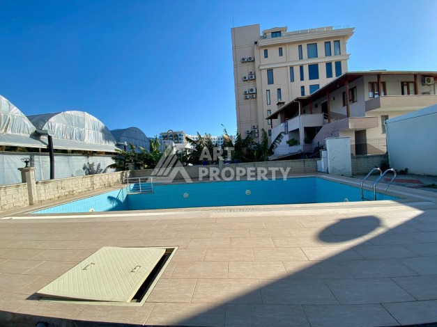 Квартира 1+1 с видом на море  всего в 100 метрах от моря в районе Каргыджак - Ракурс 6