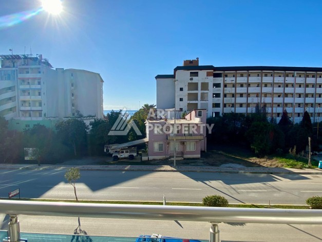 Квартира 1+1 с видом на море  всего в 100 метрах от моря в районе Каргыджак - Ракурс 7