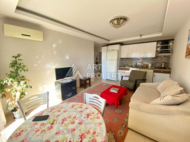 Квартира 1+1 с видом на море  всего в 100 метрах от моря в районе Каргыджак - Ракурс 10