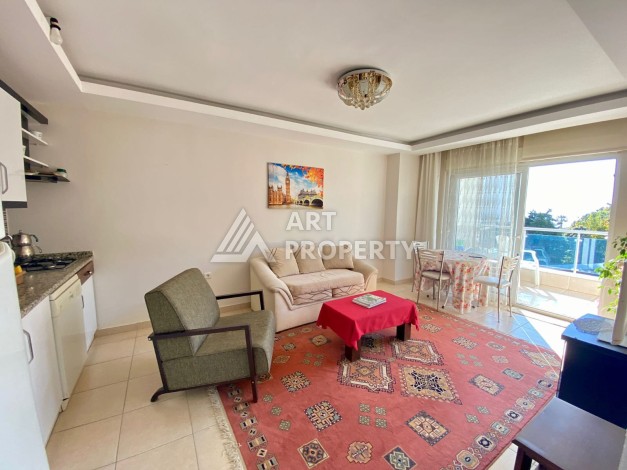 Квартира 1+1 с видом на море  всего в 100 метрах от моря в районе Каргыджак - Ракурс 11