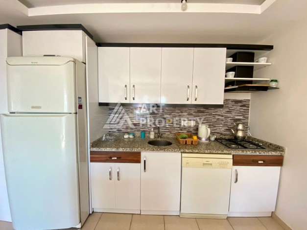 Квартира 1+1 с видом на море  всего в 100 метрах от моря в районе Каргыджак - Ракурс 14