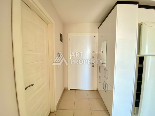 Квартира 1+1 с видом на море  всего в 100 метрах от моря в районе Каргыджак - Ракурс 15