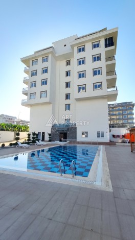 Квартира 1+1 с видом на море в районе Каргыджак - Ракурс 2