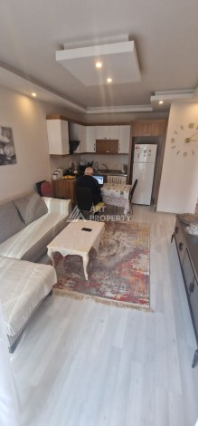 Просторная  квартира 1+1 в развитом районе Махмутлар - Ракурс 6