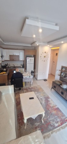 Просторная  квартира 1+1 в развитом районе Махмутлар - Ракурс 7