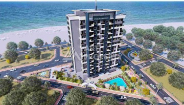 Квартиры 2+1 и 3+1 в строящейся резиденции у моря в Мерсине, от 79,5 кв.м. - Ракурс 1