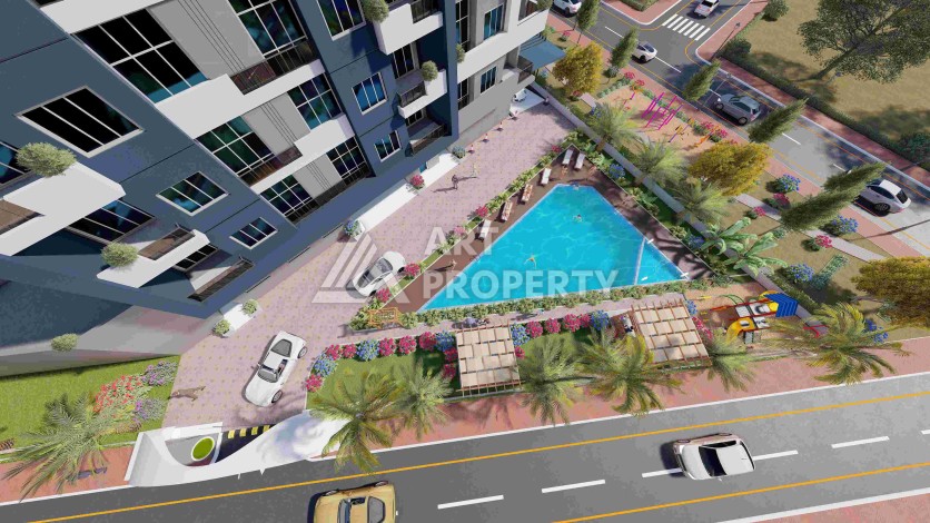 Квартиры 2+1 и 3+1 в строящейся резиденции у моря в Мерсине, от 79,5 кв.м. - Ракурс 5