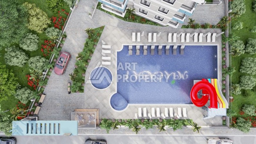 Комплекс комфорт класса в районе Демирташ с собственным пляжем - Ракурс 6