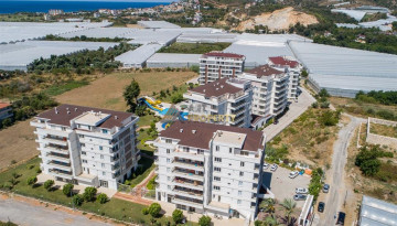 Квартиры 2+1 по отличным ценам в комплексе с инфраструктурой в Демирташ, 100 м2 - Ракурс 8