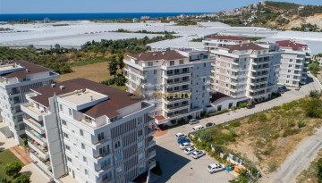 Квартиры 2+1 по отличным ценам в комплексе с инфраструктурой в Демирташ, 100 м2 - Ракурс 9