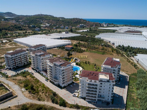 Квартиры 2+1 по отличным ценам в комплексе с инфраструктурой в Демирташ, 100 м2 - Ракурс 9