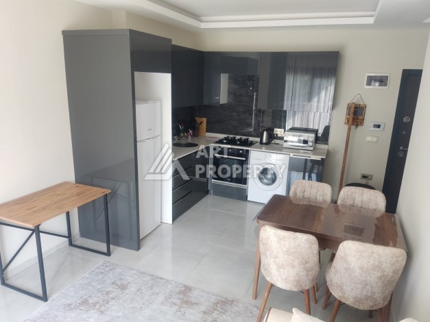 Меблированная квартира 1+1 по выгодной цене в Махмутларе, 43 кв.м. - Ракурс 9