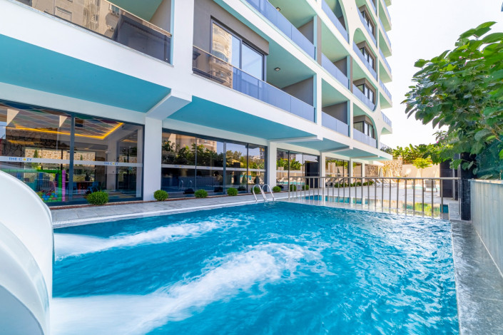 Квартира 1+1 в новом комплексе с инфраструктурой 5* отеля в тихом месте Махмутлара, 75 м2 - Ракурс 8