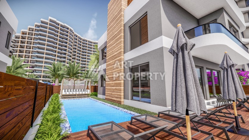 Премиум проект с квартирами 1+1, 2+1, 3+1 и 4+1 виллами в 150 метрах от моря. Томюк, Мерсин. - Ракурс 6