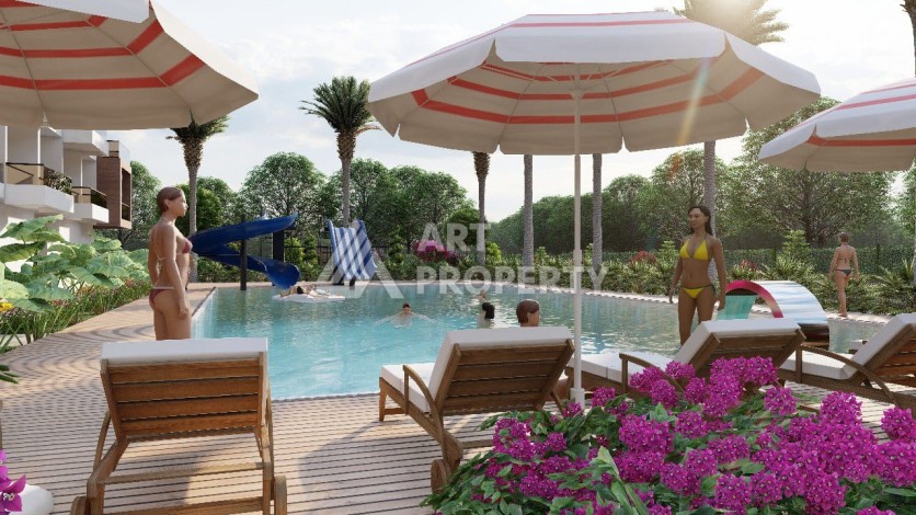 Квартиры 1+1 в минутной доступности от прекрасного пляжа в районе Арпачбахшиш, 65 кв.м. - Ракурс 3