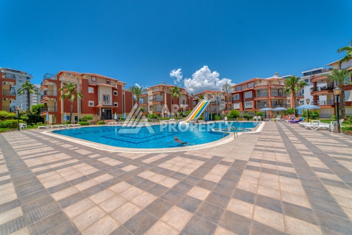 Дуплекс 4+1 с выходом в сад всего в 150 метрах от моря, 280 кв.м. Кестель, Алания. - Ракурс 3