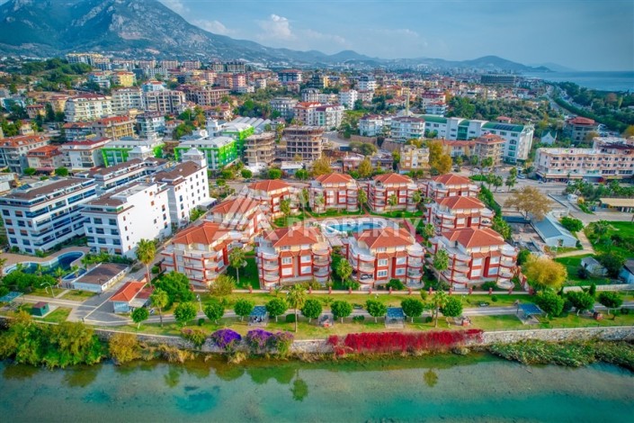 Дуплекс 4+1 с выходом в сад всего в 150 метрах от моря, 280 кв.м. Кестель, Алания. - Ракурс 7