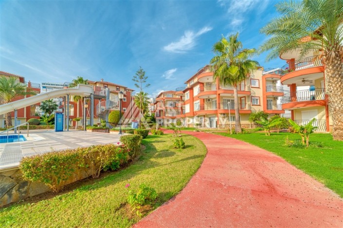 Дуплекс 4+1 с выходом в сад всего в 150 метрах от моря, 280 кв.м. Кестель, Алания. - Ракурс 9