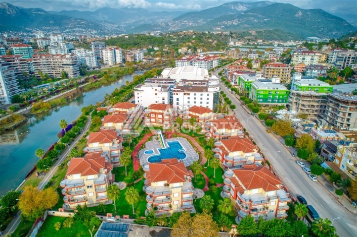 Дуплекс 4+1 с выходом в сад всего в 150 метрах от моря, 280 кв.м. Кестель, Алания. - Ракурс 11