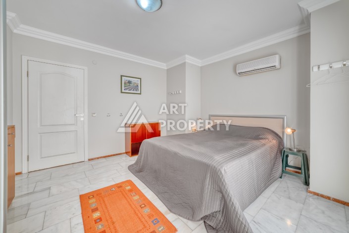 Дуплекс 4+1 с выходом в сад всего в 150 метрах от моря, 280 кв.м. Кестель, Алания. - Ракурс 16