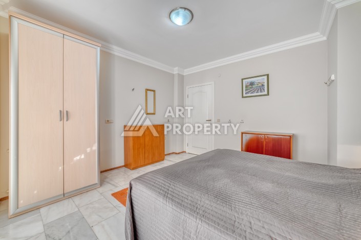 Дуплекс 4+1 с выходом в сад всего в 150 метрах от моря, 280 кв.м. Кестель, Алания. - Ракурс 24