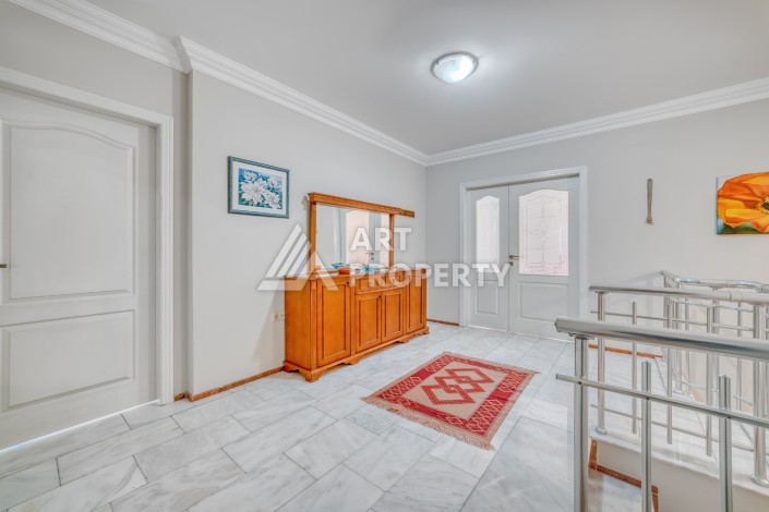 Дуплекс 4+1 с выходом в сад всего в 150 метрах от моря, 280 кв.м. Кестель, Алания. - Ракурс 26