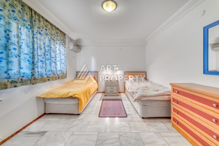 Дуплекс 4+1 с выходом в сад всего в 150 метрах от моря, 280 кв.м. Кестель, Алания. - Ракурс 41