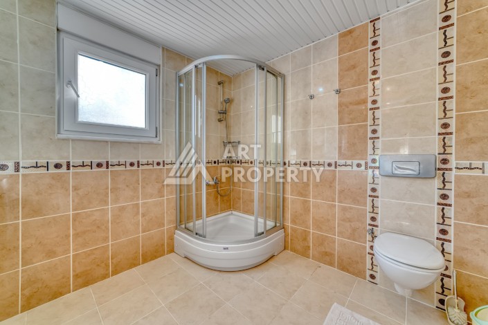 Дуплекс 4+1 с выходом в сад всего в 150 метрах от моря, 280 кв.м. Кестель, Алания. - Ракурс 46