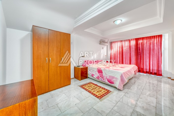 Дуплекс 4+1 с выходом в сад всего в 150 метрах от моря, 280 кв.м. Кестель, Алания. - Ракурс 47