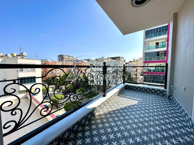 Трехкомнатная современная квартира 81 кв.м. в 350 метрах от моря в Махмутларе - Ракурс 3