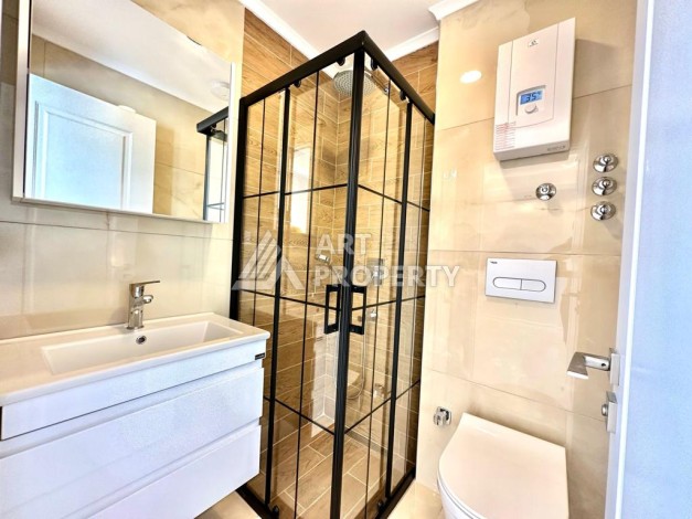 Трехкомнатная современная квартира 81 кв.м. в 350 метрах от моря в Махмутларе - Ракурс 6