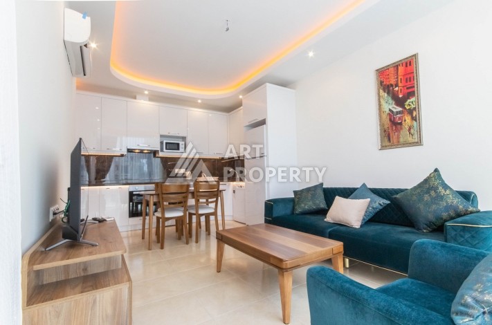 Квартира 1+1 с видом на море в элитном комплексе, 50 кв.м. Махмутлар, Алания. - Ракурс 2