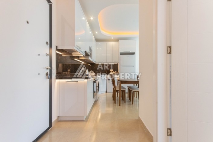 Квартира 1+1 с видом на море в элитном комплексе, 50 кв.м. Махмутлар, Алания. - Ракурс 7