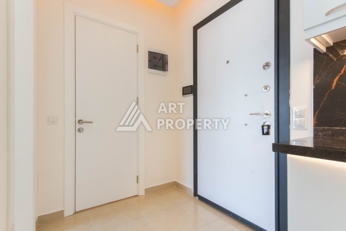 Квартира 1+1 с видом на море в элитном комплексе, 50 кв.м. Махмутлар, Алания. - Ракурс 9