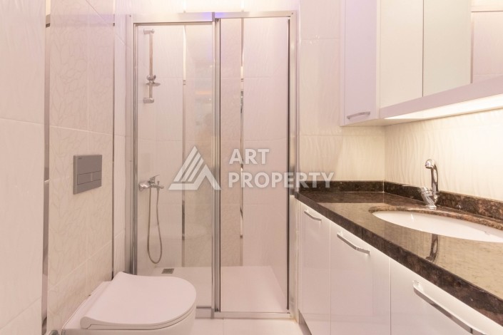 Квартира 1+1 с видом на море в элитном комплексе, 50 кв.м. Махмутлар, Алания. - Ракурс 10