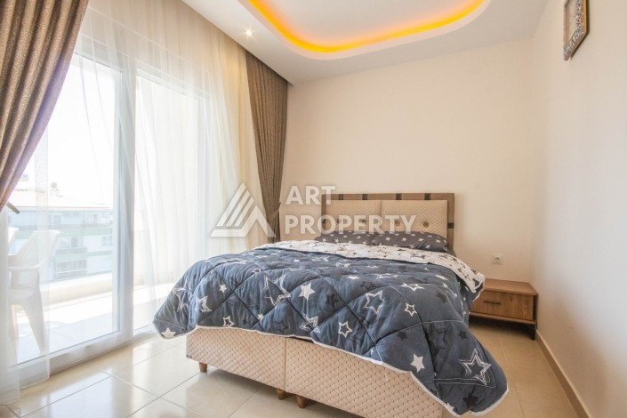 Квартира 1+1 с видом на море в элитном комплексе, 50 кв.м. Махмутлар, Алания. - Ракурс 12