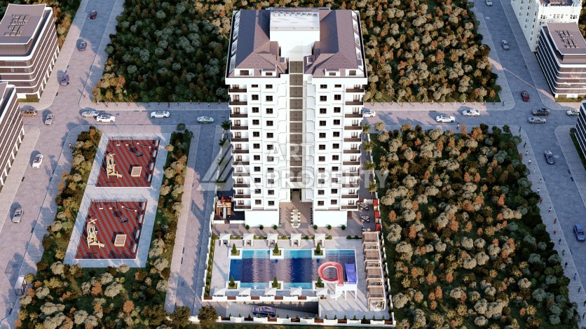 Престижная резиденция высокого качества в 150 метрах от моря в центре Махмутлара, квартиры от 55 кв.м. - Ракурс 0
