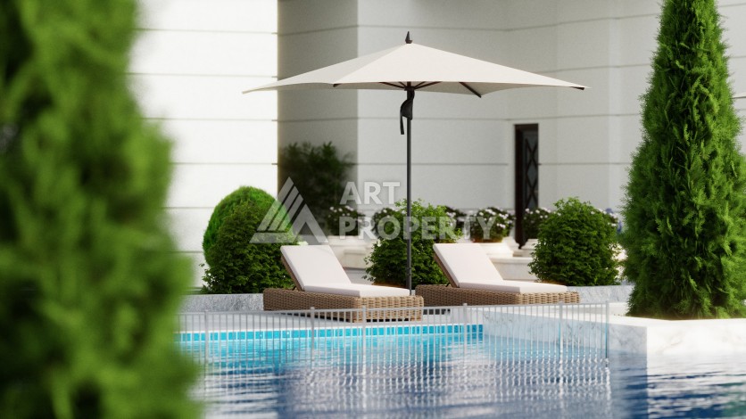 Престижная резиденция высокого качества в 150 метрах от моря в центре Махмутлара, квартиры от 55 кв.м. - Ракурс 5