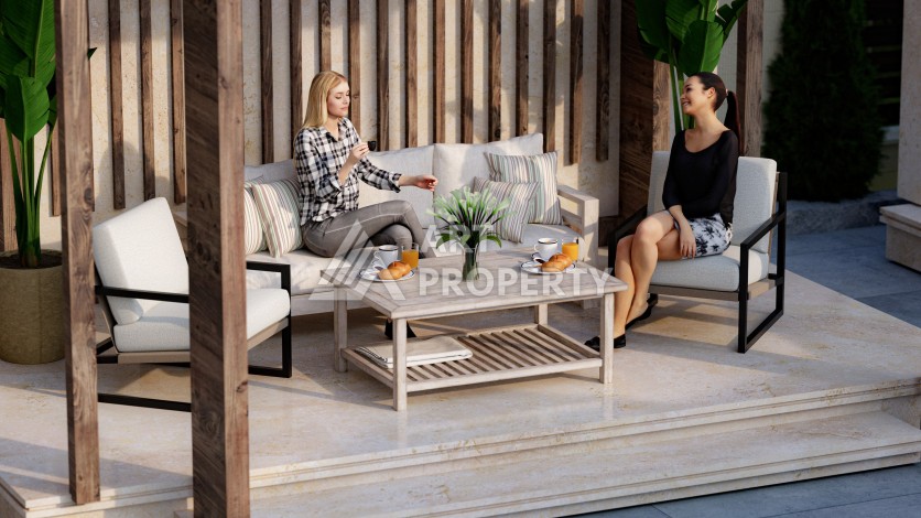 Престижная резиденция высокого качества в 150 метрах от моря в центре Махмутлара, квартиры от 55 кв.м. - Ракурс 6