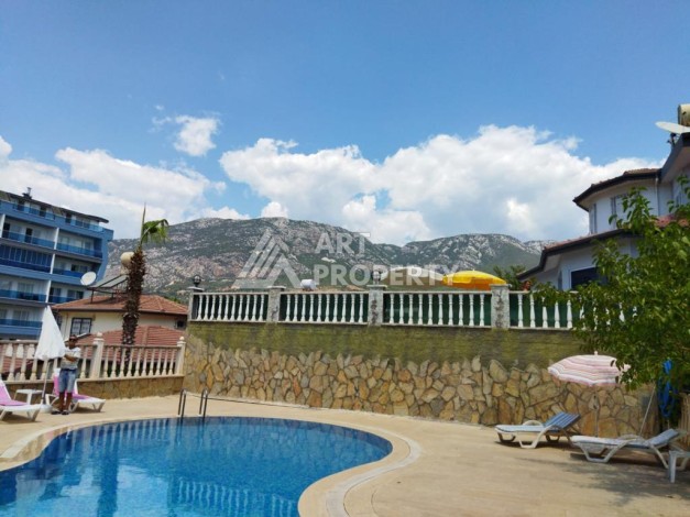 Уютная вилла 5+1 с бассейном и гаражом в Махмутларе, 395 кв.м. - Ракурс 4