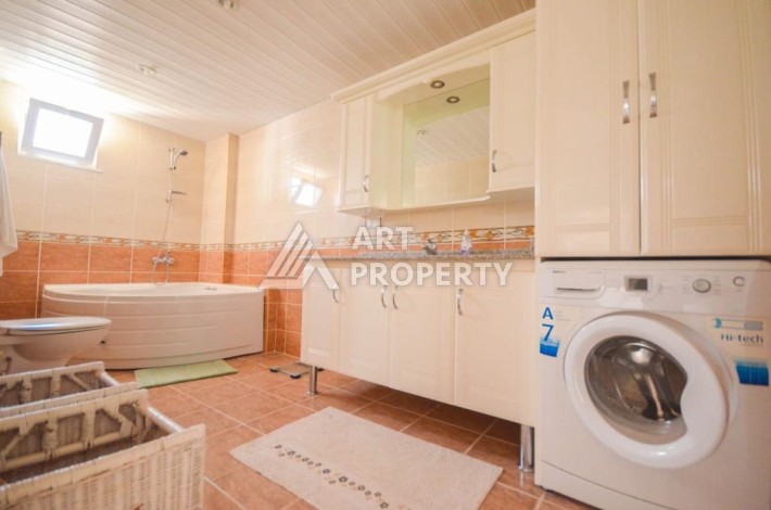 Уютная вилла 5+1 с бассейном и гаражом в Махмутларе, 395 кв.м. - Ракурс 18