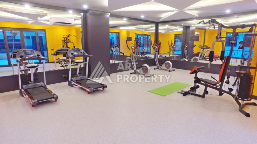 Квартира 1+1 с видом на море на первой береговой линии в Махмутларе, 61 кв.м. - Ракурс 8