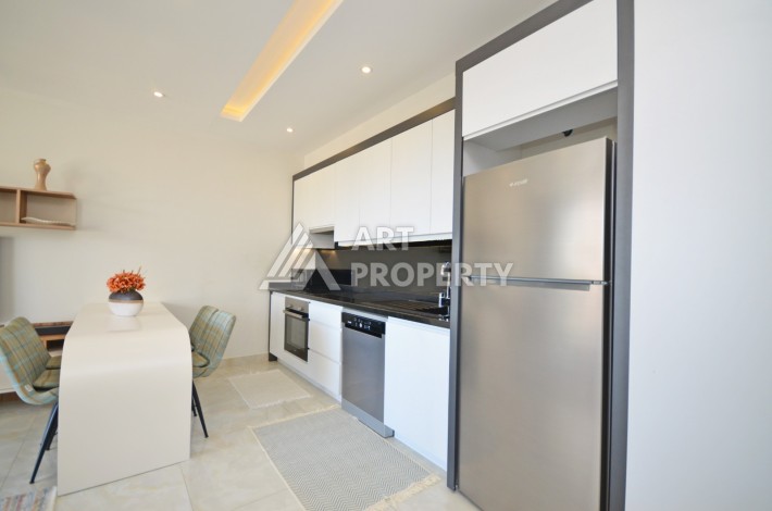 Квартира 1+1 с видом на море на первой береговой линии в Махмутларе, 61 кв.м. - Ракурс 13