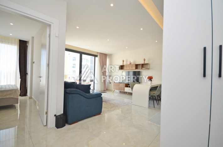 Квартира 1+1 с видом на море на первой береговой линии в Махмутларе, 61 кв.м. - Ракурс 14