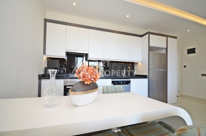 Квартира 1+1 с видом на море на первой береговой линии в Махмутларе, 61 кв.м. - Ракурс 17