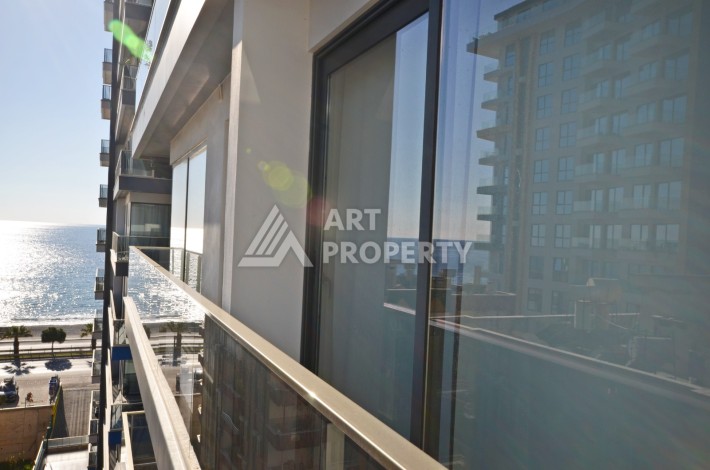 Квартира 1+1 с видом на море на первой береговой линии в Махмутларе, 61 кв.м. - Ракурс 19